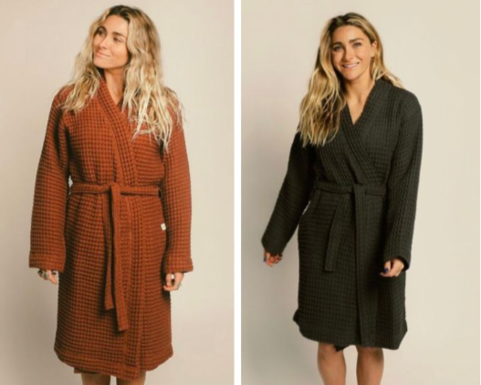 Three different colored robes worn by a model on a plain background